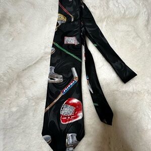 Stylish Black Hockey Tie with Red and Silver Details